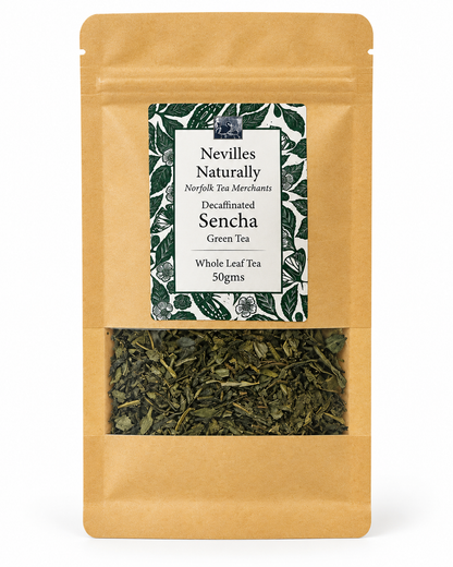 Loose-leaf decaffeinated sencha green tea in a white dish