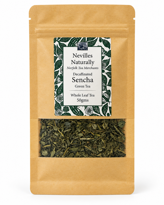 Loose-leaf decaffeinated sencha green tea in a white dish